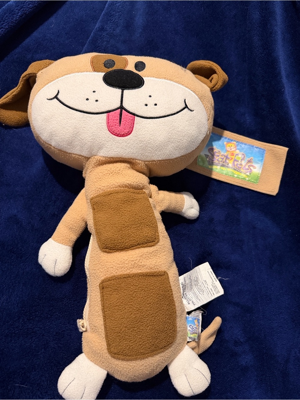 Seat Pet - Tan & White plush dog with Pink Tongue Smoke free and pet free home.